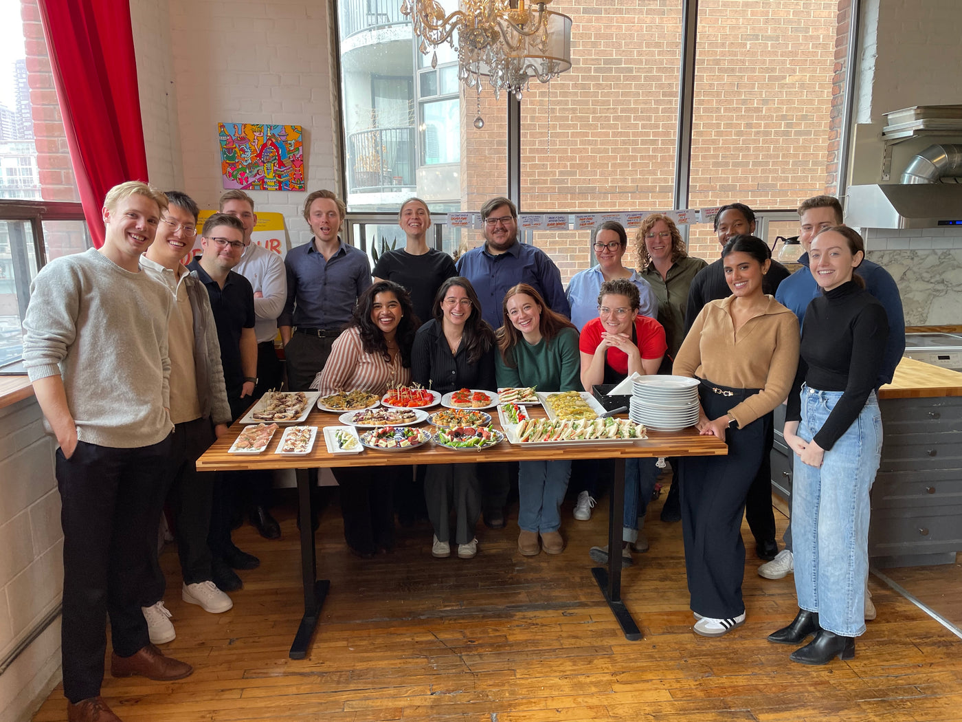 Group shot in front of the food they made