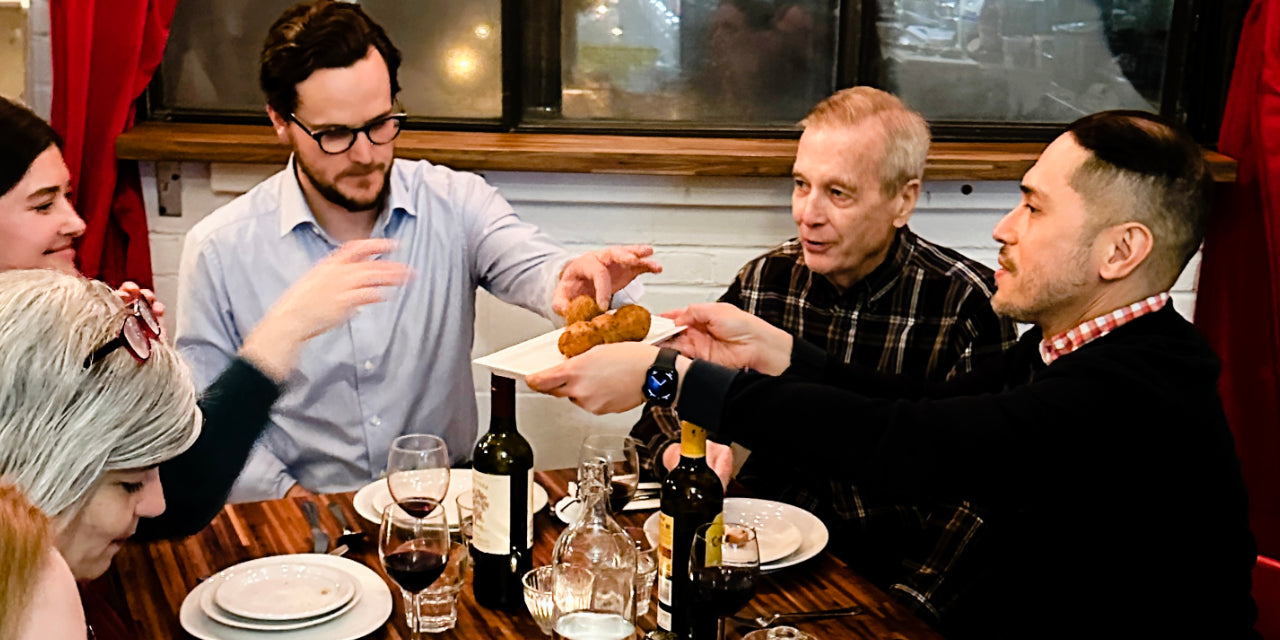 IFL table people sharing food