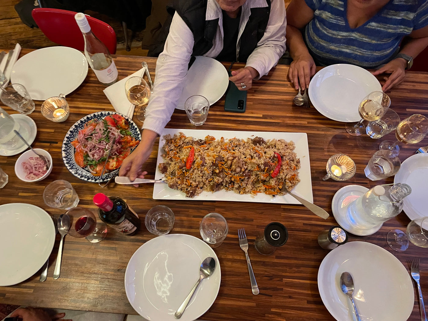 guests passing a plate